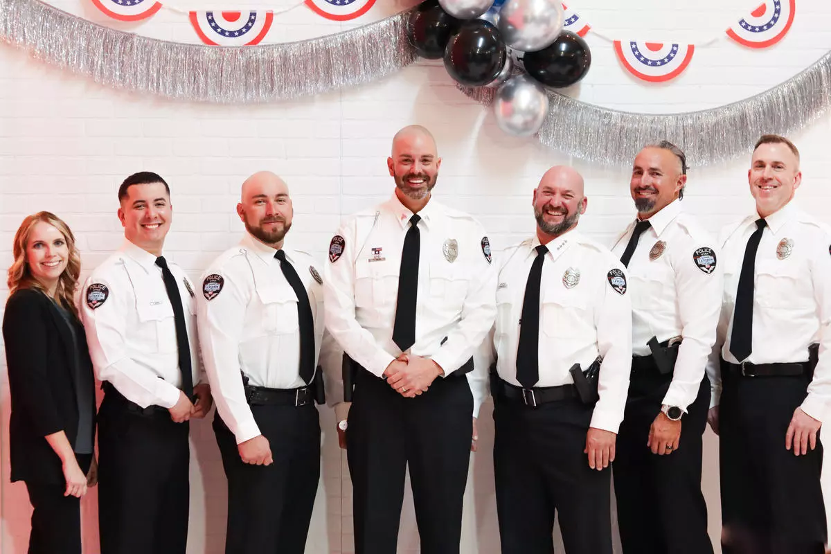 A photo depicting the police department in their class A uniforms.